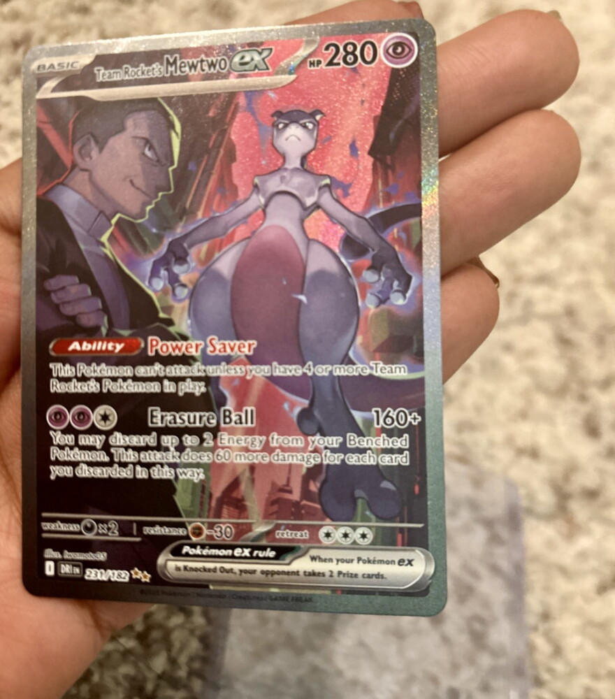 This Mewtwo and Giovanni Pokémon card was one about 100 cards Audy McAfee sold to cover moving costs to San Diego.