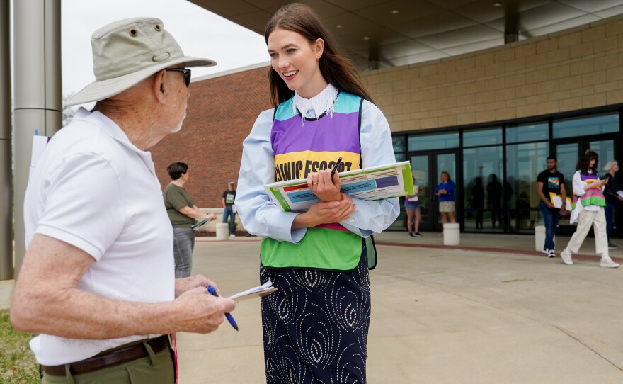 Karlie Kloss, right, speaks to a volunteer for Missourians for Constitutional Freedom, a group attempting to legalize abortion in the state, on Monday, April 1, 2024, at Congregation Shaare Emeth in Creve Coeur, Mo.