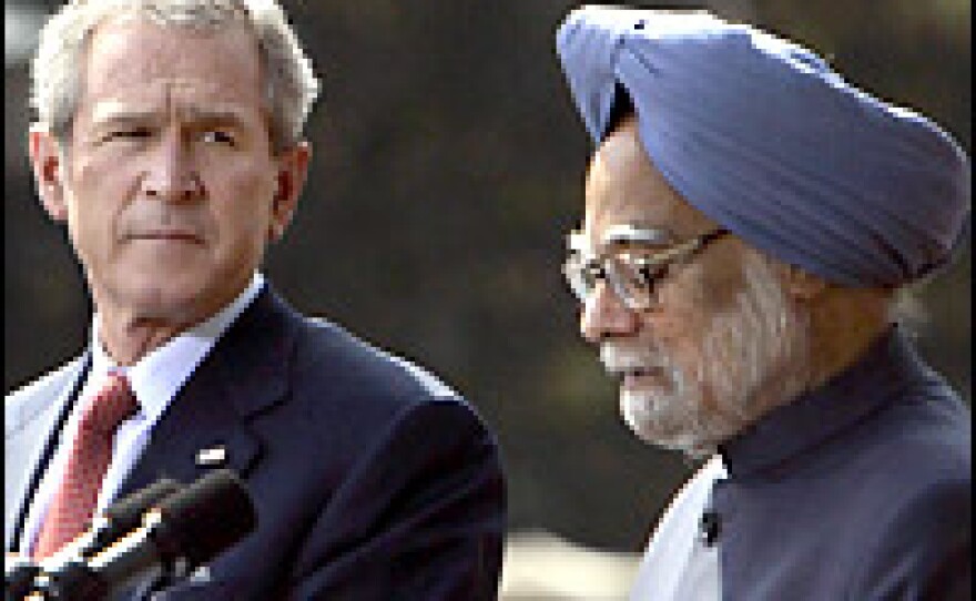 U.S. President George W. Bush (L) and Indian Prime Minister Manmohan Singh address a joint press conference following a meeting at Hyderabad House in New Delhi on Thursday.