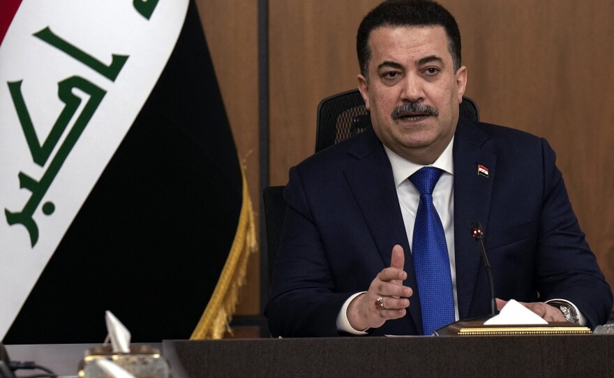 Iraqi Prime Minister Mohammed Shia al-Sudani chairs a meeting with top-ranking officials of the Iraqi armed forces and of the U.S.-led coalition about the future of American and other foreign troops in the country, in Baghdad on Jan. 27.