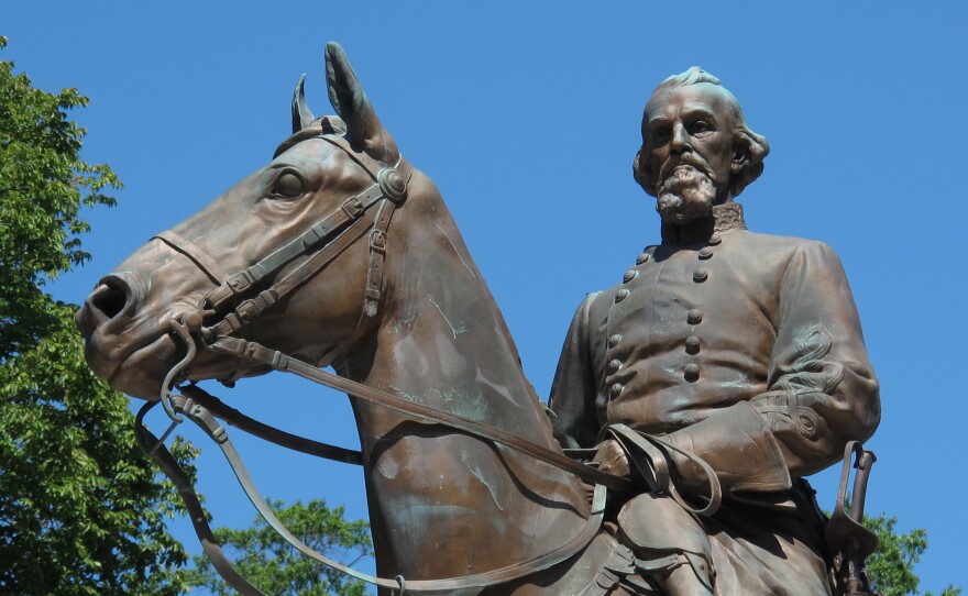 This statue of Confederate Gen. Nathan Bedford Forrest was removed from a park in Memphis, Tenn., on Wednesday night, following the sale of the park to a nonprofit group.