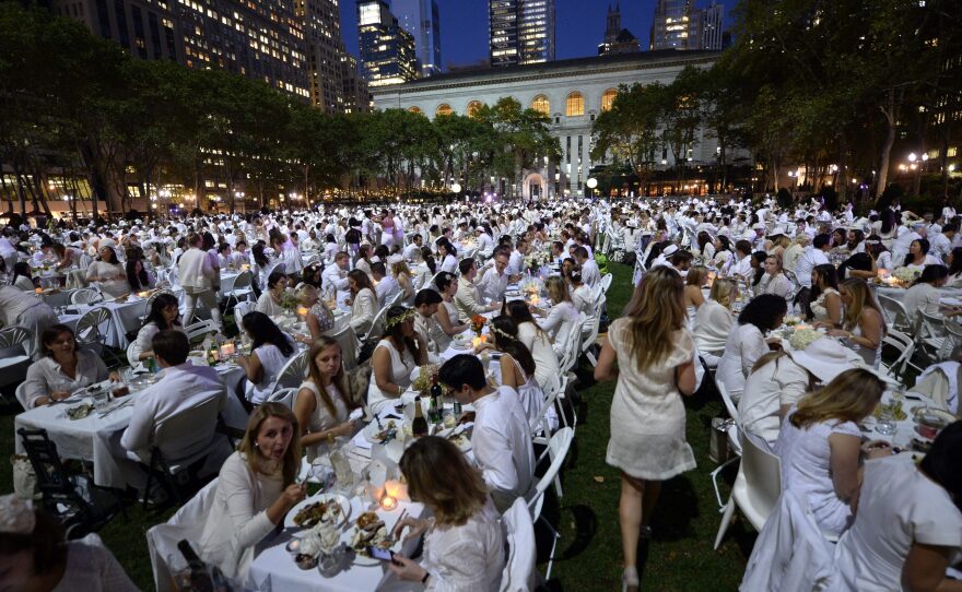 Some 4,000 guests, all dressed in white, showed up for the secret dinner party in New York City's Bryant Park.