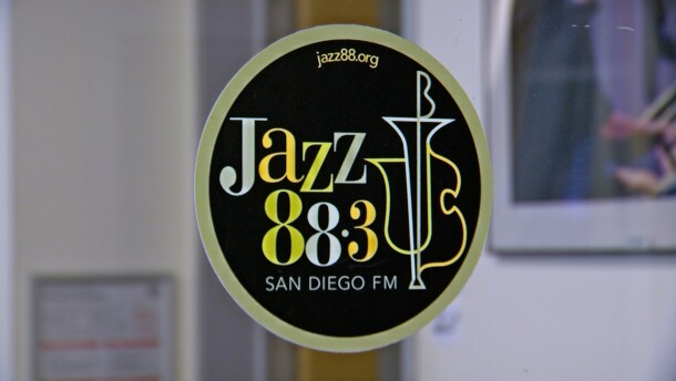 The logo of KSDS Jazz 88.3 is shown on a glass station door on August 5, 2025.