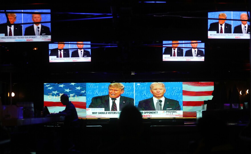 A broadcast of the first debate between President Trump and Democratic nominee Joe Biden is played on TVs at The Abbey in West Hollywood, Calif.