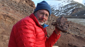 Neil Shubin with Tiktaalik Fossil.