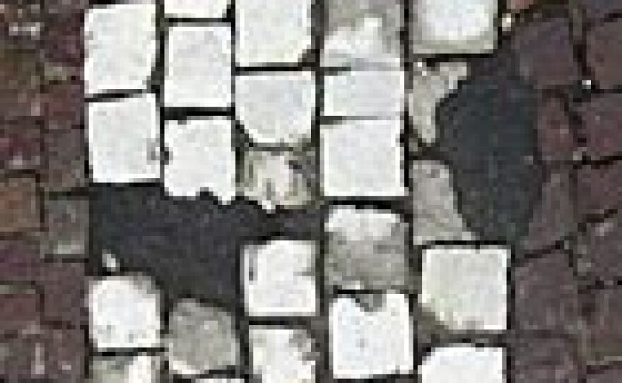 After more than a decade of tight budgets, some of that marble is cracked and covered with asphalt.