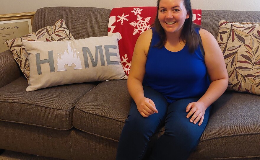 Laura Kraft in her apartment in the Orlando area. She moved across the country for a new job and couldn't believe how much it cost to rent a place.