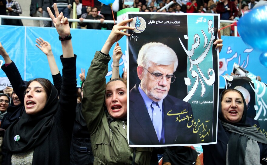 Iranian women chant support for Mohammad Reza Aref, a reformist candidate in Friday's parliamentary election. This is the first election since Iran signed a nuclear deal with world powers last summer, followed by the lifting of many sanctions at the beginning of this year.