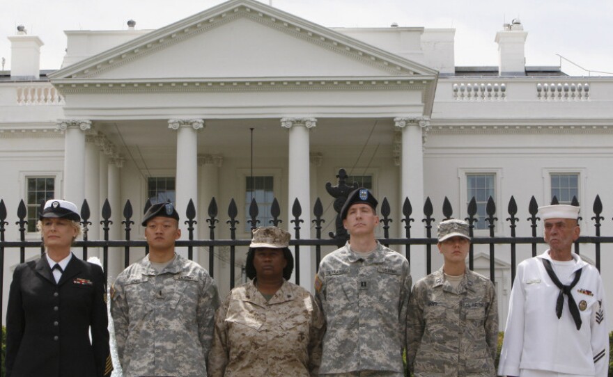 Service members handcuffed themselves to the White House fence during an April protest for gay rights. The potential repeal of the "don't ask, don't tell" policy barring openly gay troops from serving raises practical questions about housing and fairness for the Pentagon.