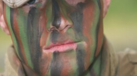 Soldier in face paint