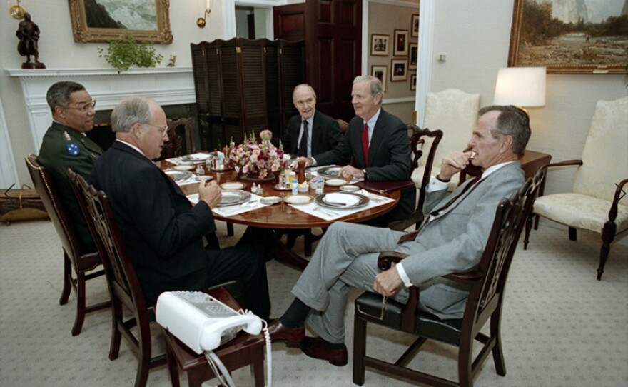 (From left) Colin Powell, Richard Cheney, Brent Scowcroft, and James Baker meet with President Bush, June 26, 1992