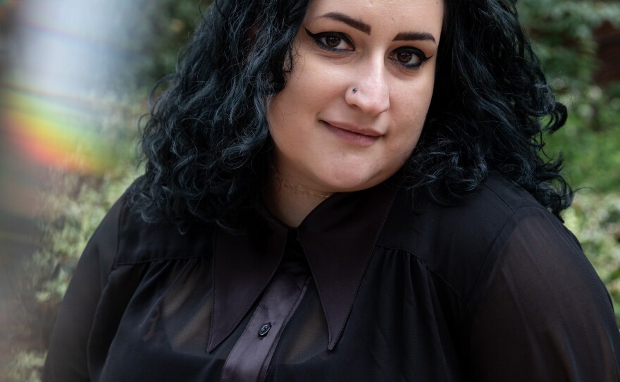 Cáer Smith brought clothing she doesn't wear in the hopes others would repurpose them at the Plus Size Swap + Shop at Philly Fat Con. She also picked up a swim dress, a brown silky button down and a black velvet dress from the swap.