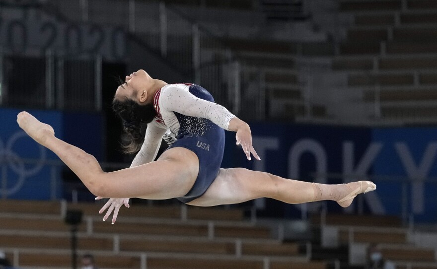 U.S. gold medalist Sunisa Lee performs on the floor during the gymnastics women's all-around final.