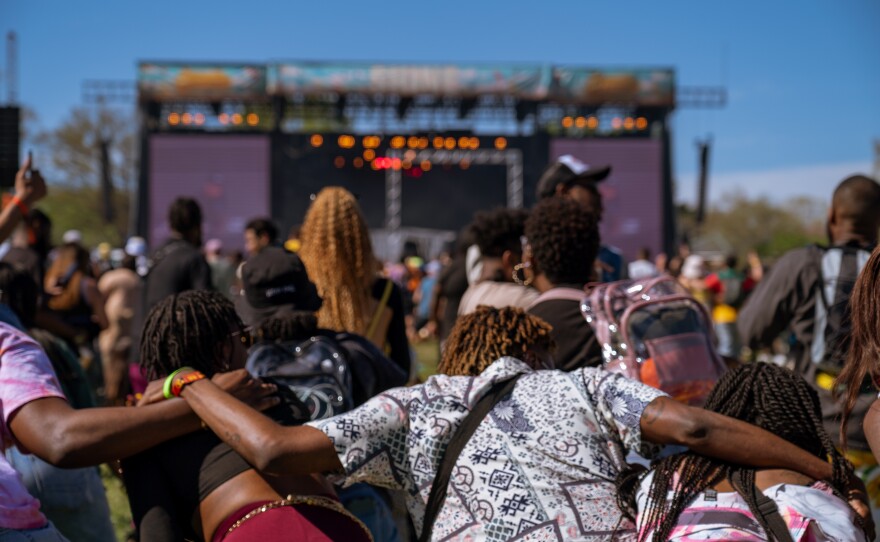 The crowd dances to the music at the Dreamville Music Festival in Raleigh, N.C.