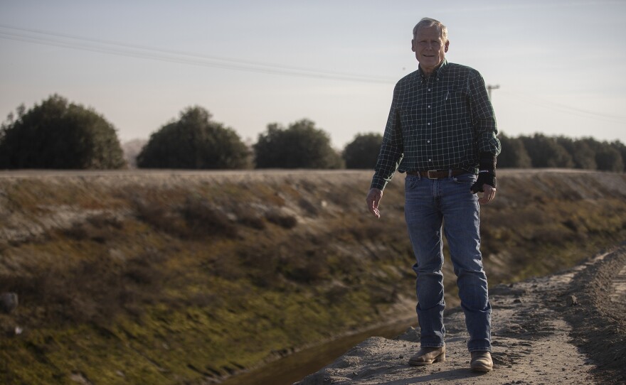 Don Cameron, the Vice President and General Manager of Terranova Ranch, stands near the canal on the ranch on Feb 21, 2025. Cameron has installed several miles of canals, headgates, and pump systems to bring more water to his Terranova Ranch from the Kings River during floods. Photo by Larry Valenzuela, CalMatters/CatchLight Local