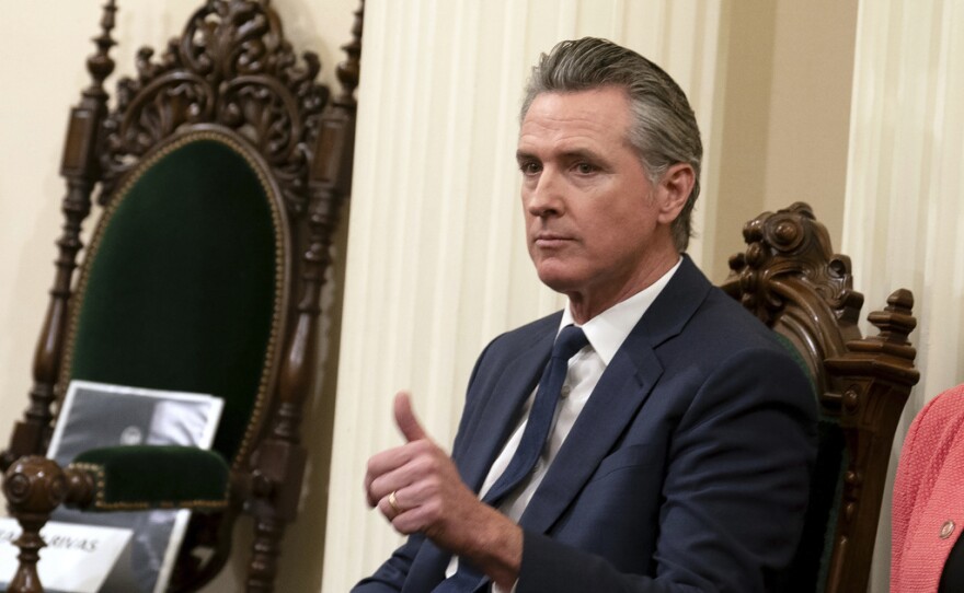 California Gov. Gavin Newsom gives a "thumbs up" talks while attending the Assembly's Organizational Session in Sacramento, Calif., Dec. 2, 2024.