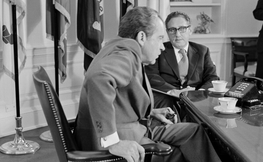 President Nixon meets Secretary of State Henry Kissinger in the Oval Office of the White House on Oct. 9, 1973. Days before the 1972 election, Kissinger declared that peace was "at hand" in Vietnam.