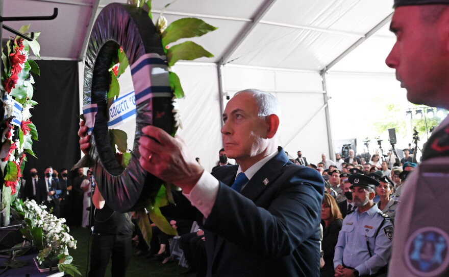 Israeli Prime Minister Benjamin Netanyahu lays a wreath during a state memorial ceremony in memory of those killed in the Oct. 7, 2023, Hamas-led attack on Israel, at Mount Herzl cemetery in Jerusalem on Oct. 5.