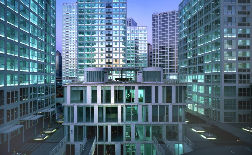 At Beijing's Jian Wai SOHO, traffic is diverted underground to maximize pedestrian space.