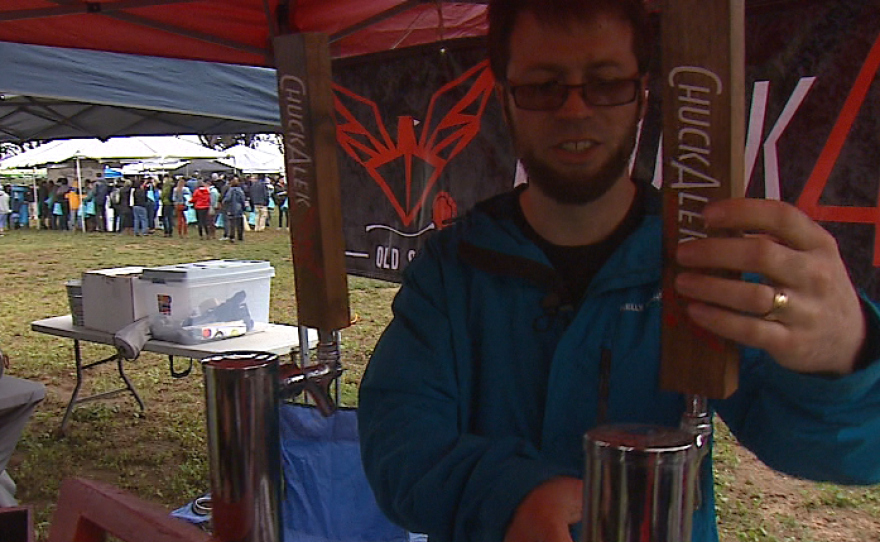 Grant Fraley pours a sour beer he brewed using a specific strain of bacteria, Jan. 31, 2016.