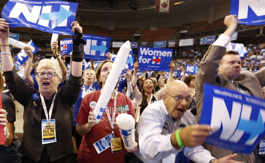 Supporters of Democratic presidential candidate Hillary Clinton cheer as she arrives at the state's annual Democratic convention Saturday in Manchester, N.H.