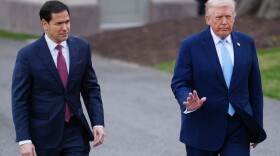 President Donald Trump walks with Secretary of State Marco Rubio to speak with reporters before departing on Marine One from the South Lawn of the White House, Friday, March 20, 2026, in Washington.