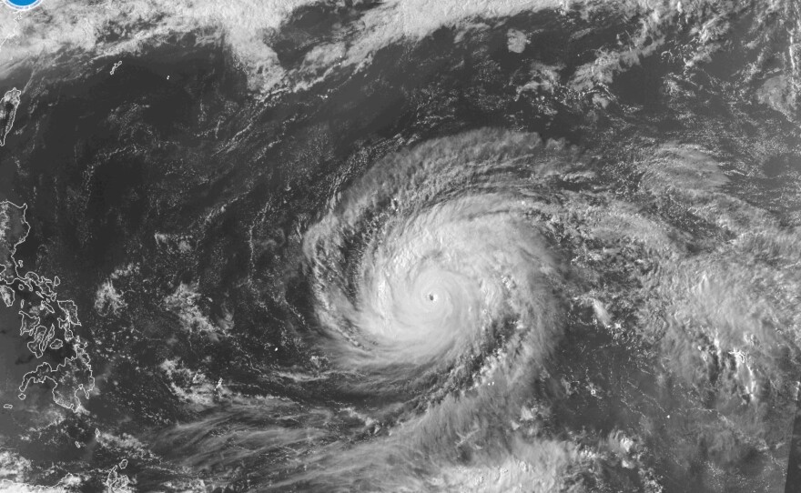 This satellite image provided by the National Oceanographic and Atmospheric Administration (NOAA) shows super typhoon Sinlakua in the Pacific Ocean, Monday, April 13, 2026.