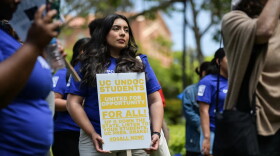 Students rally in support of undocumented students, urging University of California leaders to remove hiring restrictions for them, in front of Kerckhoff Hall at UCLA in Los Angeles on May 17, 2023.