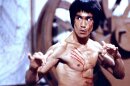 Bruce Lee brought a new, cool, powerful image of Asians to the screen with a series of martial arts action films like "Enter the Dragon."