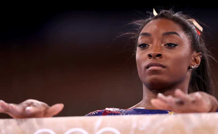 Simone Biles of Team USA competes Sunday on balance beam during the women's qualifiers on Day 2 of the Tokyo Games at Ariake Gymnastics Centre.