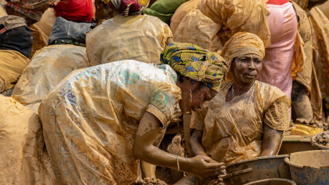 Women sift gold-bearing sediment in search of gold at the Maidede mine in the Democratic Republic of Congo's Ituri province on June 16.