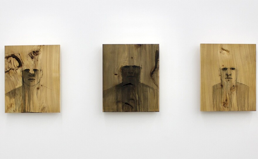 Artist John Singletary's "Self Portrait in a Tree" series of three oil paintings, 2025.