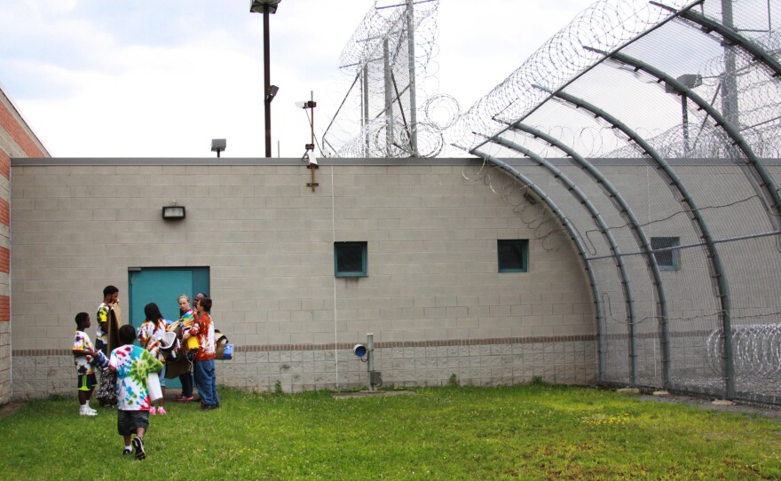 Hope House campers wear tie-die shirts they made to the last day of camp at Western Correctional Institution in Cumberland, Md.