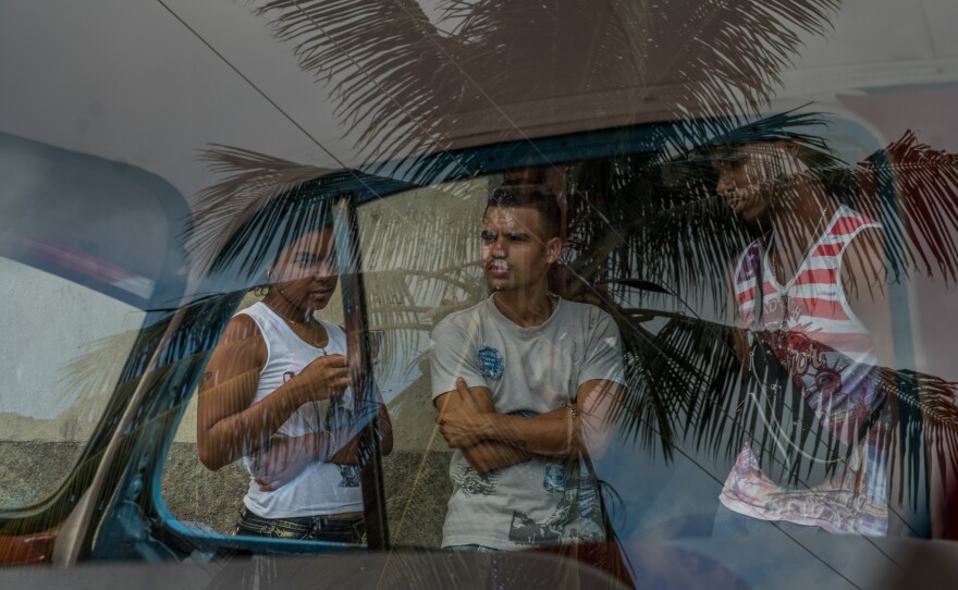 Since Gabriel's best friend left Cuba this year without telling him, he spends a lot more time with his sister Gabriella (left) and her boyfriend, Juan Miguel Romero Cabrera.
