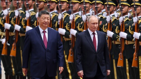 Russian President Vladimir Putin, right, and Chinese President Xi Jinping inspect an honor guard during a welcoming ceremony at the Great Hall of the People in Beijing Wednesday, May 20, 2026.