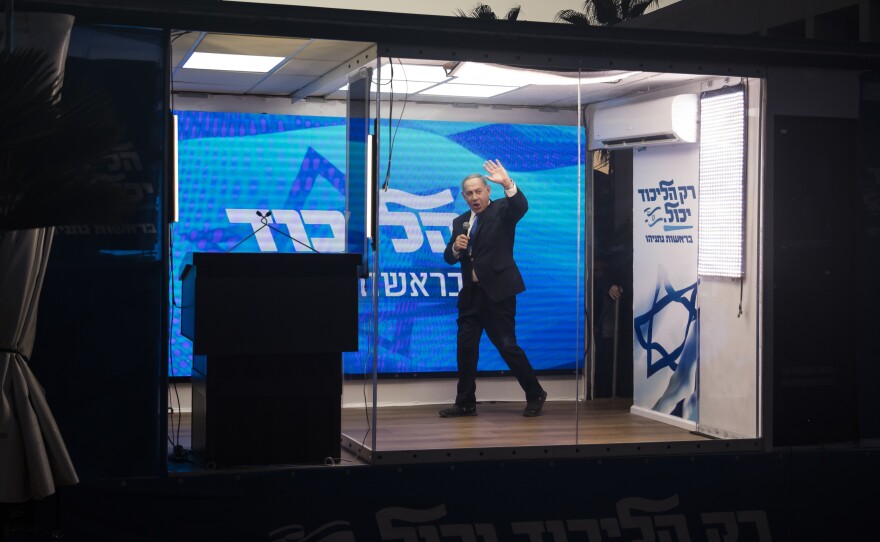 Former Israeli Prime Minister Benjamin Netanyahu speaks from a modified truck during a campaign event in Hadera, Israel, on Oct. 6. Israel will hold a national election Tuesday, after its coalition government collapsed in June.