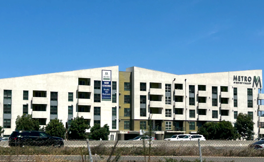 Apartments leasing next to the I-8 freeway in San Diego's Mission Valley neighborhood.