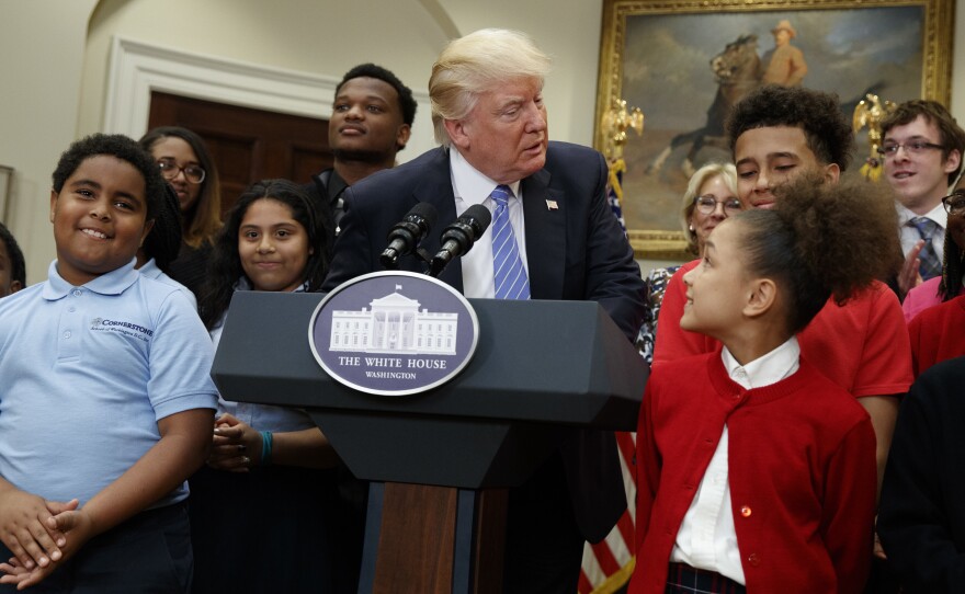 President Trump speaks during a school choice event at the White House.