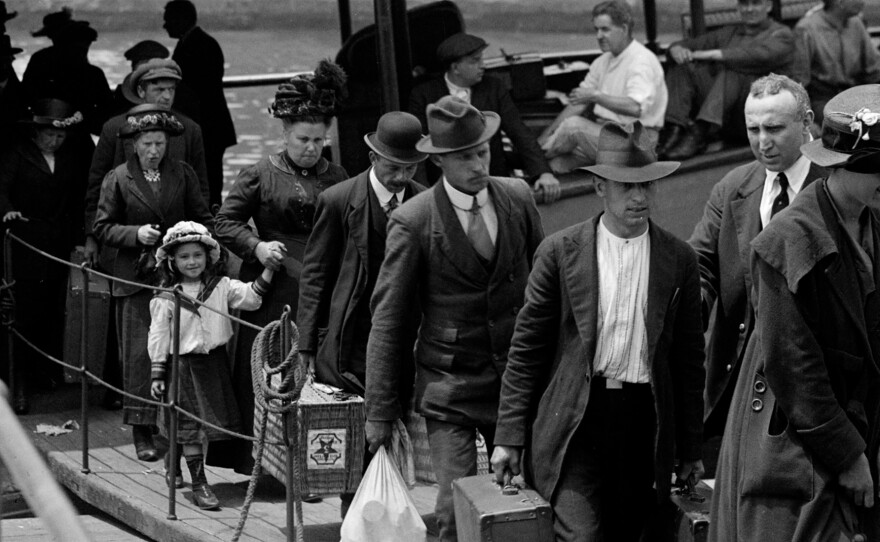 Immigrants arrive at Ellis Island, circa 1912.