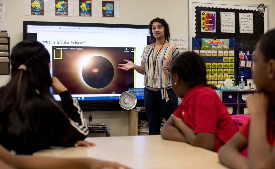 Natasha Cummings also led her fifth graders through a solar eclipse lesson. The older kids' eclipse simulation incorporated measurements.