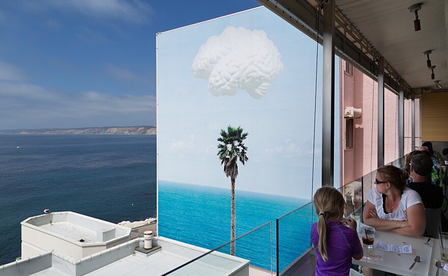 The mural by John Baldessari, visible here from George's on the Cove restaurant. You can also see it from Coast Blvd. It's called "Brain/Cloud (with Seascape and Palm Tree)"