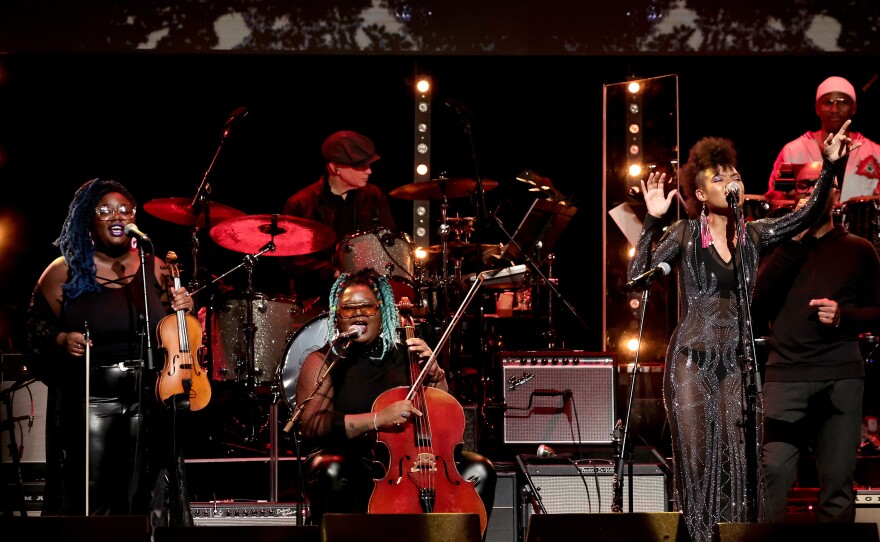 Chauntee Ross (left, with violin) and Monique Ross (center, with cello) of SistaStrings perform with Allison Russell in New York City in March 2022. The duo now plays as part of Brandi Carlile's band, and is nominated for the instrumentalist of the year award at the 2023 Americana Music Association Awards.