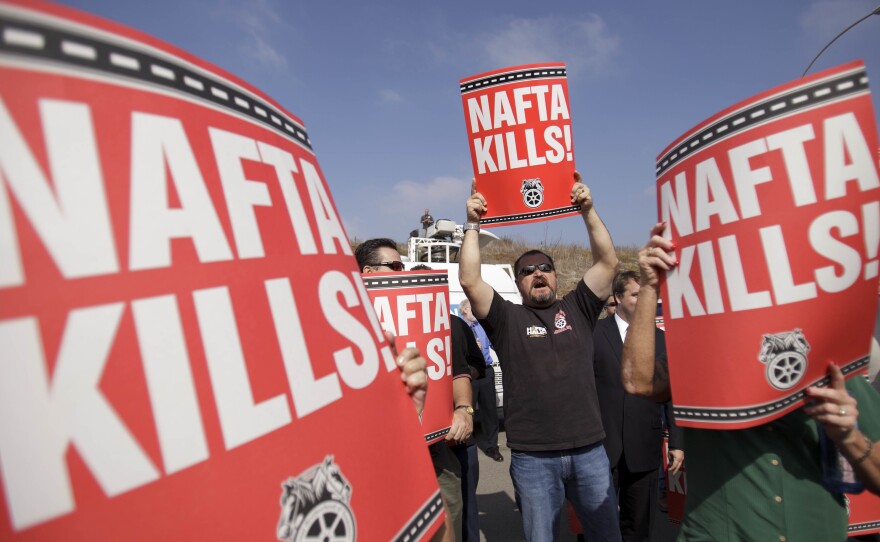 Teamsters union members in San Diego rail against the NAFTA trade deal in 2011.