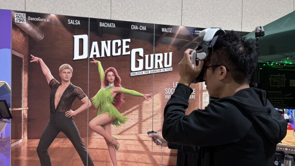 Entrepreneur David Huang tests out a VR headset while conducting demonstrations of the social dance lesson app Dance Guru at the Augmented World Expo in Long Beach, Calif., June 17, 2026.