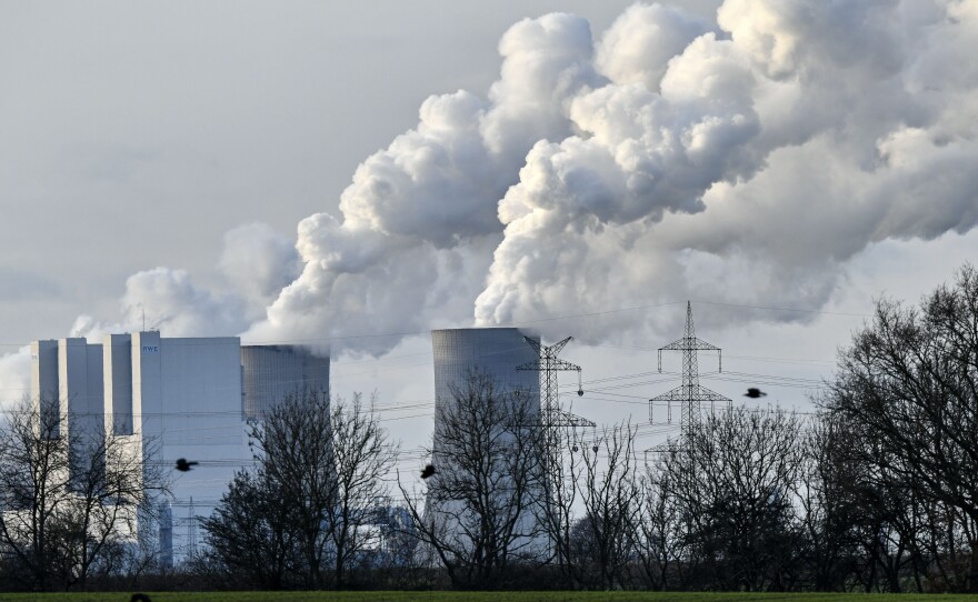 Steam blows from the RWE Niederaussem lignite-fired power station in Bergheim, Germany, in January 2020. Scientists from the National Oceanic and Atmospheric Administration say the concentration of greenhouse gases was the highest on record.