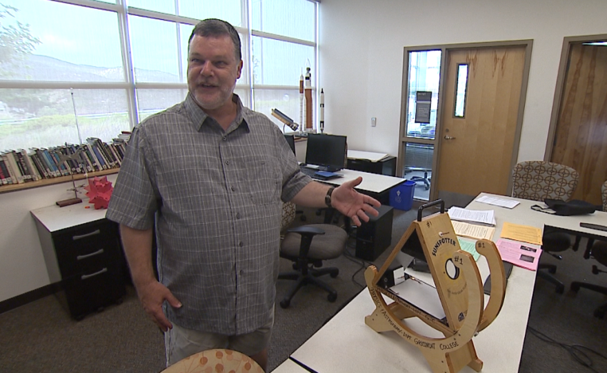 Grossmont College astronomy instructor Philip Blanco is seen describing the Sunspotter solar telescope, one of the safe ways for amateurs to view Monday's eclipse, Aug. 15, 2017.