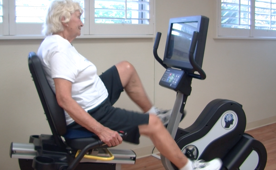 Joanne Papadakis rides a CyberCycle stationary bike at the Fredericka Manor retirement community in Chula Vista, June 29, 2015.