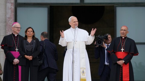 Pope Leo XIV, accompanied by, from left, Prefect of the Pontifical Household Archbishop Petar Rajič, Dean Antonella Polimeni, and his vicar for the city of Rome Cardinal Baldo Reina, visits the Città Universitaria (University City) at Sapienza University of Rome to meet with faculty and students at the institution's primary campus, one of the world's oldest and largest universities, Thursday, May 14, 2026.