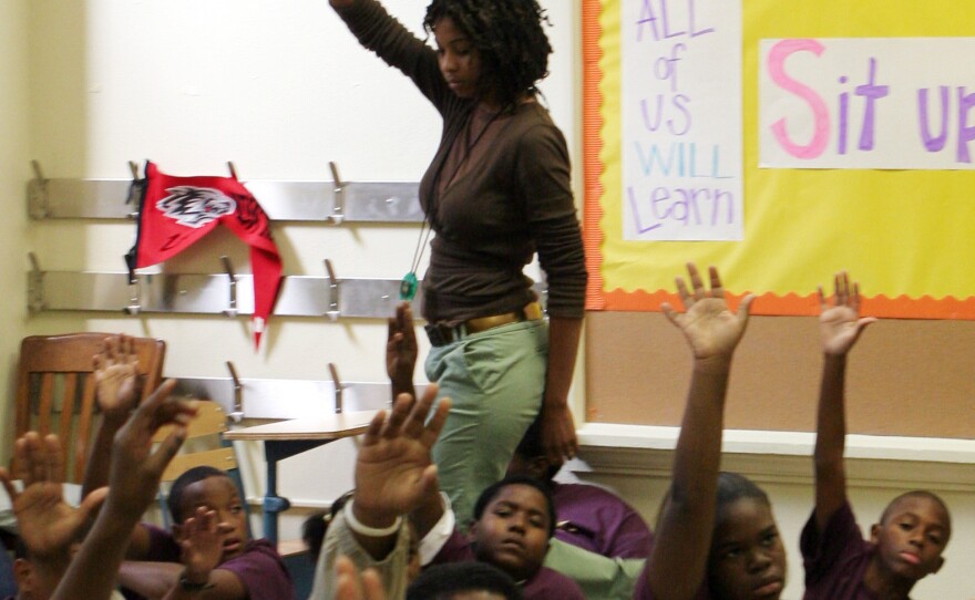Teacher Towana Pierre-Floyd in her classroom at New Orleans West in 2005. It's a structured charter school set up for students and teachers displaced by the storm.