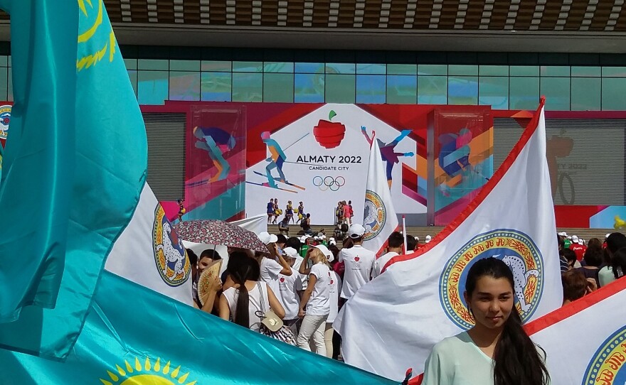 Boosters of Kazakhstan's bid for the 2022 Winter Olympics rally in Almaty as they wait for word of whether their city won. It didn't, forcing Kazakhstan back to the drawing board for ways to achieve international recognition.